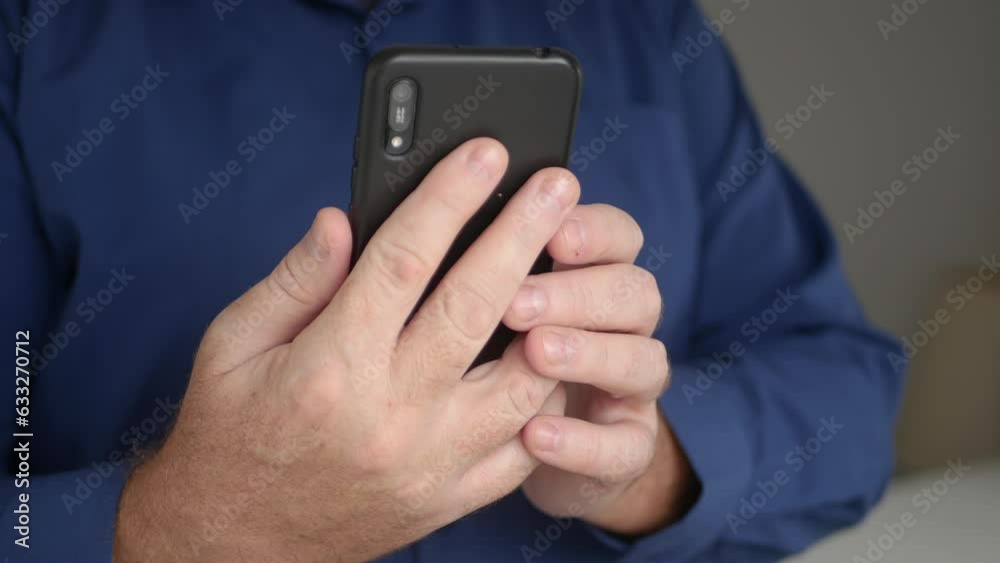Blurred Shooting with a Person Making Photos with Mobile Phone Using Flash Light. Making Pictures with Flash for Social Media. Blurred Shooting with a Person Making Photos with Mobile Phone Using Flash Light. Making Pictures with Flash for Social Media.