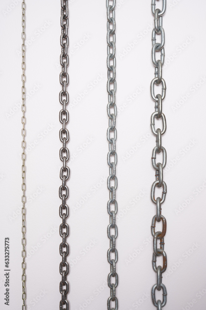 Metal chains on a white background. Metal chains on a white background.