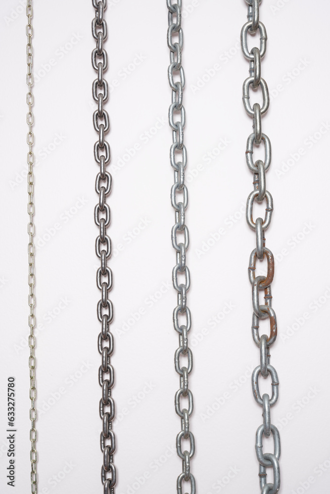 Metal chains on a white background. Metal chains on a white background.