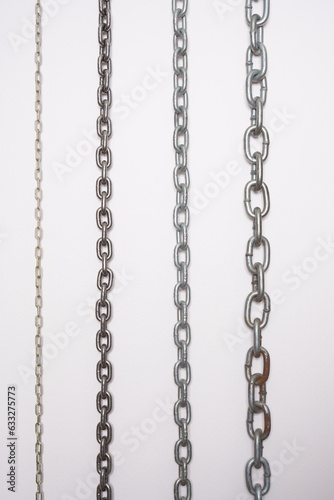 Metal chains on a white background.