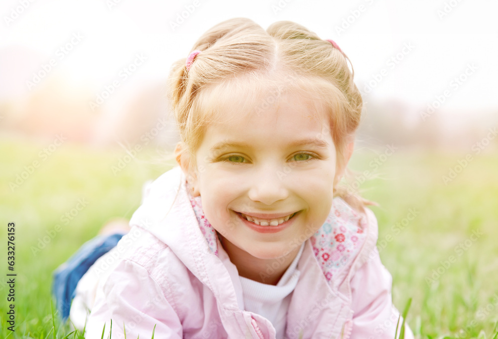 Cute little girl on the meadow in spring day Cute little girl on the meadow in spring day