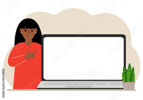 A woman next to a large laptop with plenty of space for text.