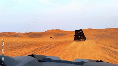 buggy in the desert at sunset photo