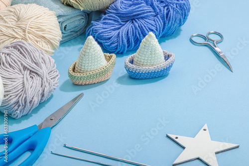 Handmade marine background. Crocheted sardine fishes, nautical style. Fishing net, sea decor photo