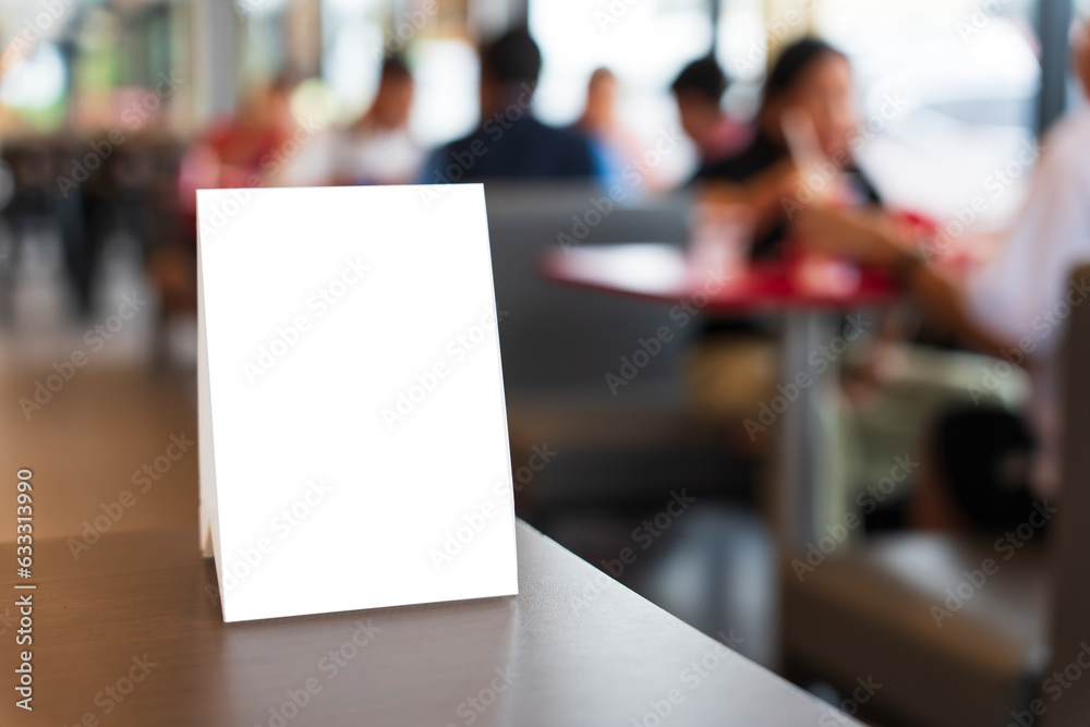 Menu mock up blank for text marketing promotion. Mock up Menu frame standing on wood table in restaurant space for text. Menu mock up blank for text marketing promotion. Mock up Menu frame standing on wood table in restaurant space for text.