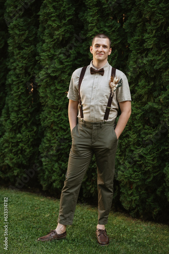young guy the groom in the image in the style of boho