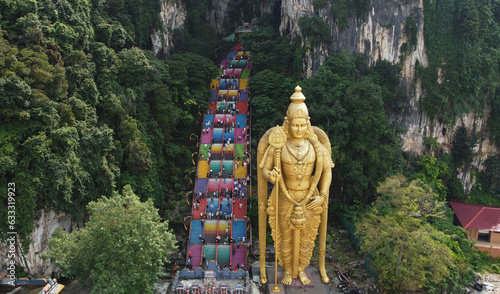 Batu Caves temple aerial view and the giant Murugan statue, Hindu God of war, in Kuala Lumpur, Malaysia.