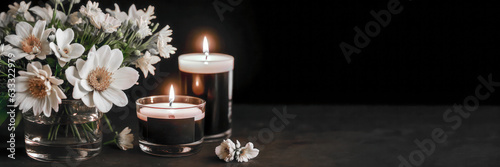 Burning candles and flowers on black background with space for text. Burning candles on floor in darkness with space for text. Funeral concept. Deepest sympathy card. Funeral concept. Generative AI