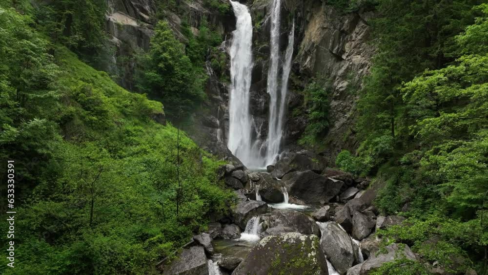 Cascata di Valclava or Kalmtaler Wasserfall waterfall in South Tirol Italy during a beautiful springtime day in the Alps. The river Kalmbach is falling down in the midst of a dense forest Cascata di Valclava or Kalmtaler Wasserfall waterfall in South Tirol Italy during a beautiful springtime day in the Alps. The river Kalmbach is falling down in the midst of a dense forest