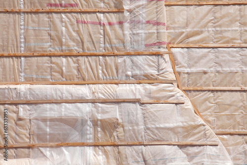 Braune Abdeckplane an einer Brandmauer, Baustelle, Hintergrund, Hintergrundbild, Textur, Deutschland