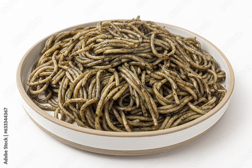 Pasta with squid ink sauce on a white background Pasta with squid ink sauce on a white background