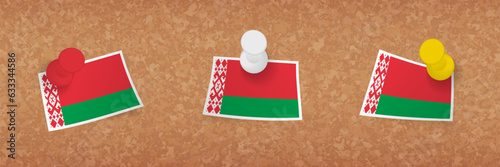 Belarus flag pinned in cork board, three versions of Belarus flag.