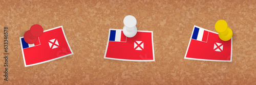Wallis and Futuna flag pinned in cork board, three versions of Wallis and Futuna flag.