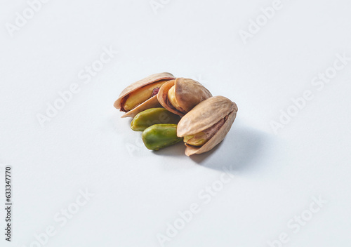 Delicious nuts and peanut on the background, close up style, in the plate still life.