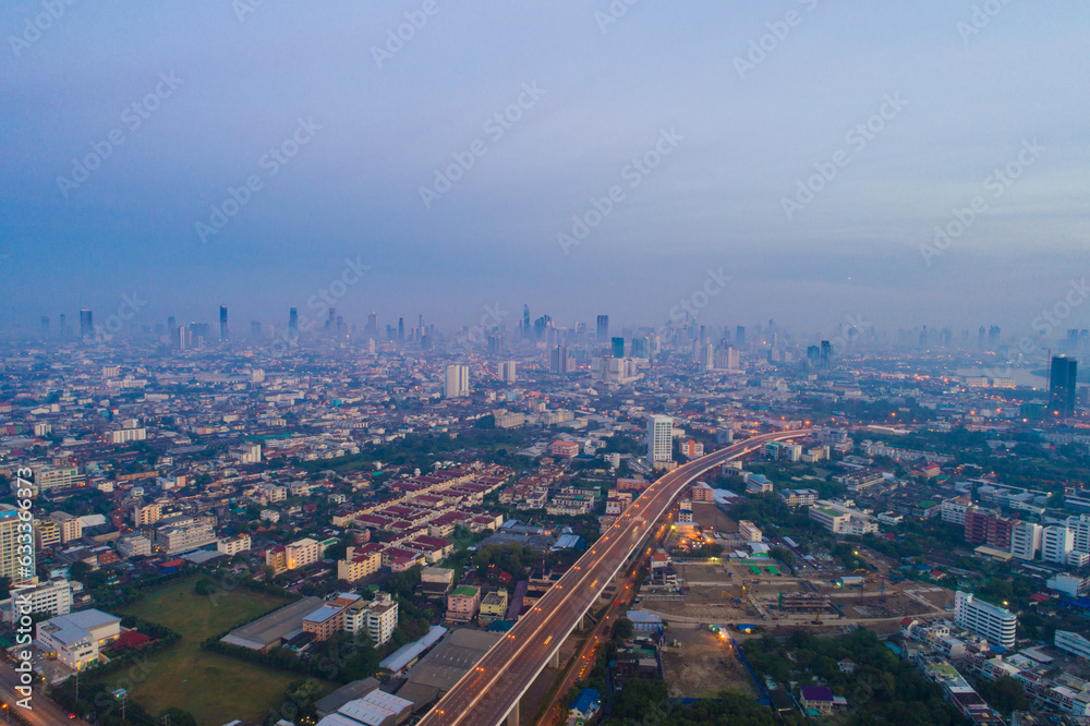 Aerial view of Bangkok city building with traffic road on  Bhumibol bridge