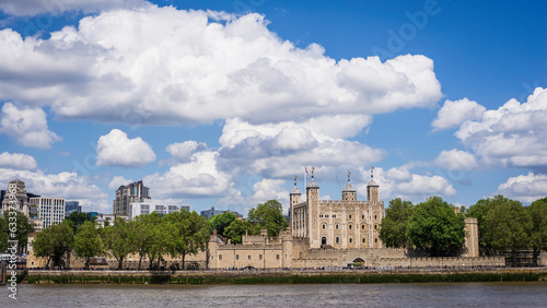 London, United Kingdom, 21 june 2023:The Tower of London castle former prison River Thames museum International Landmark architecture sunny cloudy sky Europe. his majesty's royal palace and fortress