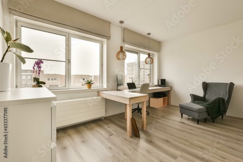 a home office with wood flooring and large windows looking out onto the cityscapeatrooms com