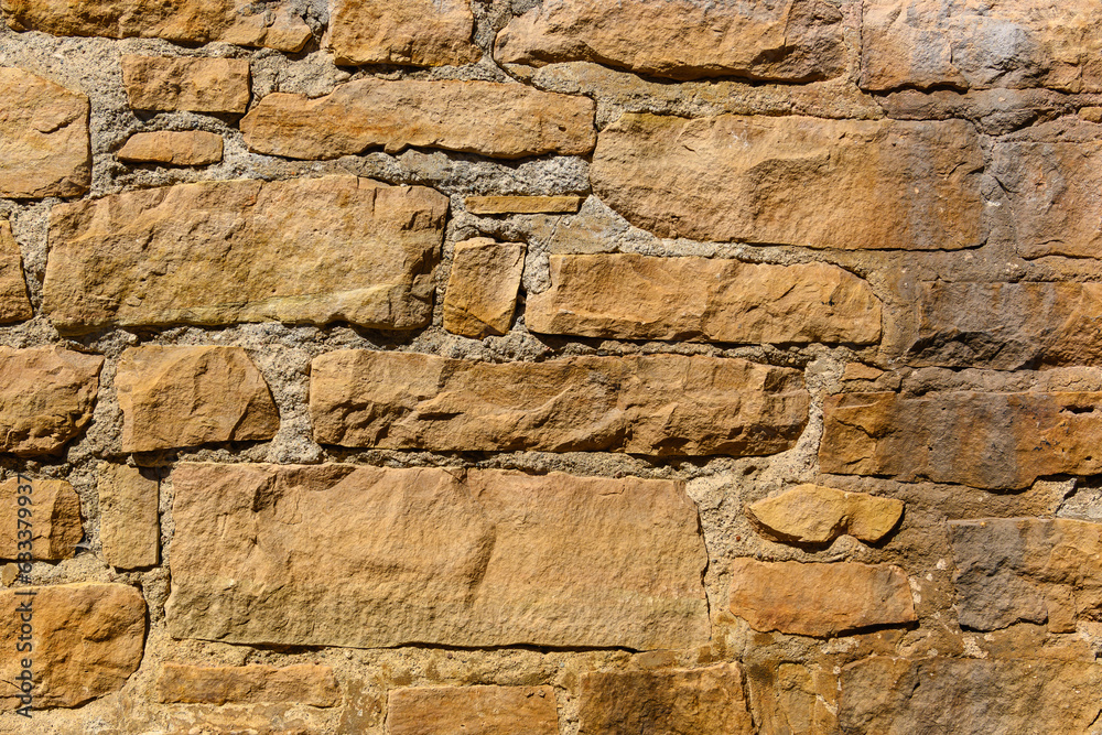 Fototapeta premium city ​​wall from old stone as a background 1