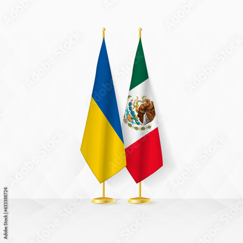 Ukraine and Mexico flags on flag stand, illustration for diplomacy and other meeting between Ukraine and Mexico.
