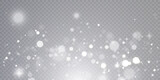 White snowflakes are flying in the air. Heavy snowfall on transparent vector background. Christmas background.