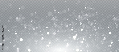 White snowflakes are flying in the air. Heavy snowfall on transparent vector background. Christmas background.
