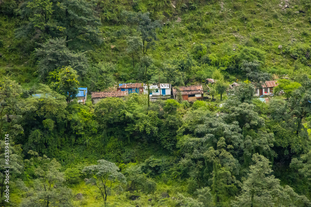 A Village in the Green Landscape during Monsoon in Myagdi, Nepal A Village in the Green Landscape during Monsoon in Myagdi, Nepal