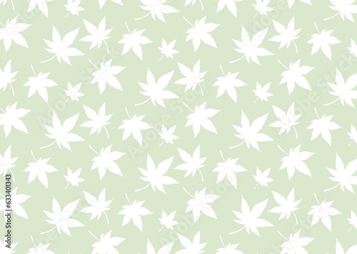 白いもみじが散りばめられたグリーン背景の壁紙  © トワトワ
