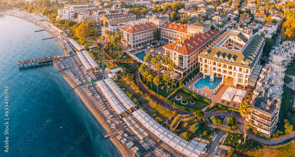 Naklejka premium picturesque village resort Kemer in Turkey, boasting a hotels with enticing swimming pool, a stunning panoramic view from above.