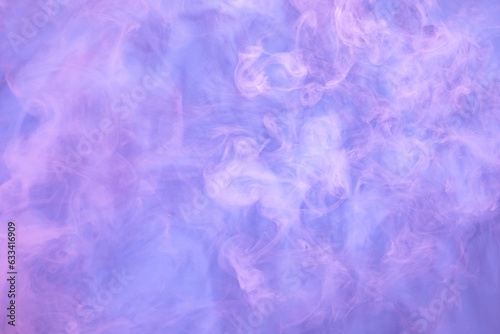 Pink and purple smoke on light blue background. Soft smoke texture