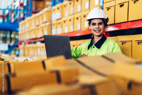 Warehouse worker working in warehouse storage. Foreman or worker work at factory site check up products in site. Inventory worker working in factory Storehouse