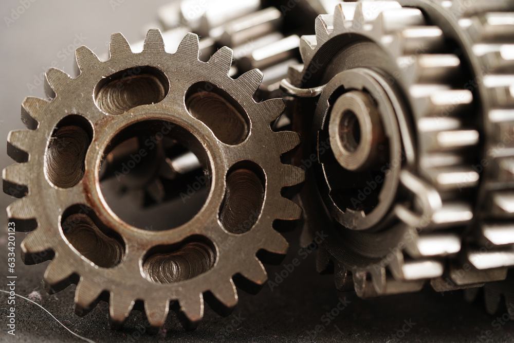 Metal gear wheel engine car and bike, mechanic industry concept. Metal gear wheel engine car and bike, mechanic industry concept.