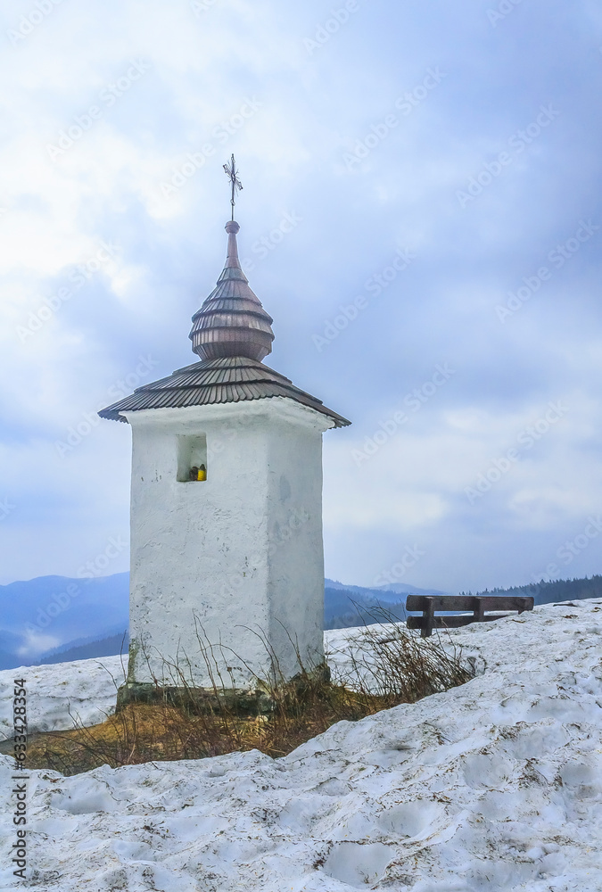 Chapel on Jaworzyna Kamienicka in Gorce (Poland) on a cloudy April evening.