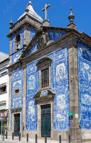 chapel of souls capela das almas with beautiful blue white azulejo tiles facade in Porto Portugal photo