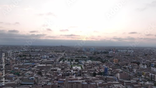 Chiclayo city sunset buildings houses all around the city. Developing city in the north of Peru.