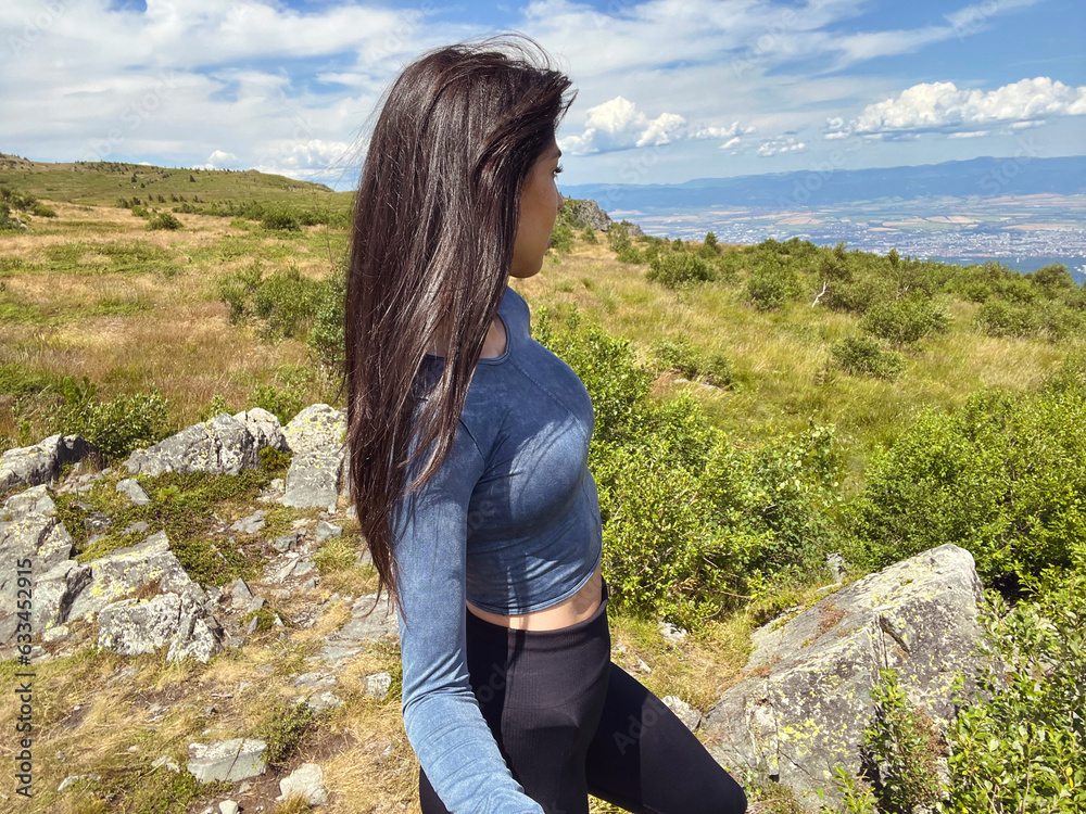 Woman in the beautiful summer mountain . Vitosha mountain ,Bulgaria