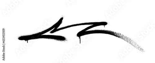 Graffiti arrow with overspray in black over white.