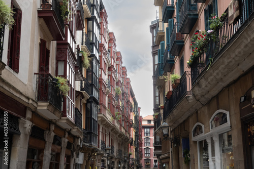 Apartments buildings lining street of Bilbao old town in Spain