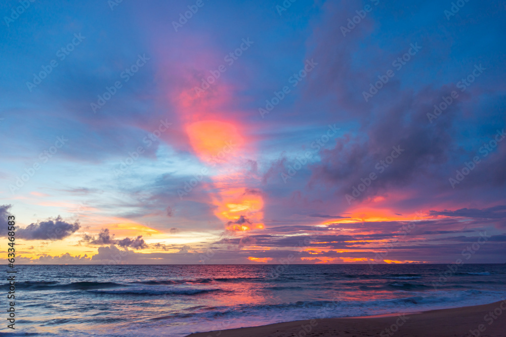 Scene of colorful pink light trough in the sky above the ocean..Scene of colorful red light trough in the dark blue sky..Gradient color. Sky texture, abstract nature background.