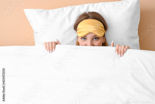 Young woman with sleeping m...