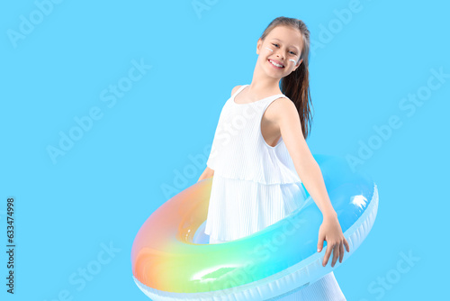 Little girl with inflatable...