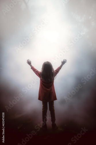 a young girl praising the lord. arms raised to the sky. god's rays of light shining down. 