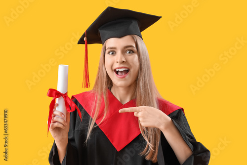Female graduate student poi...