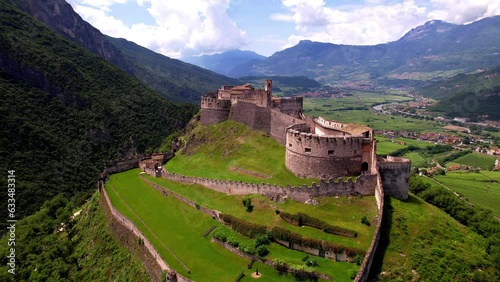 Castel Beseno aerial drone overflight in 4k - Most famous and impressive historical medieval castles of Italy in Trento province, Trentino region
 photo