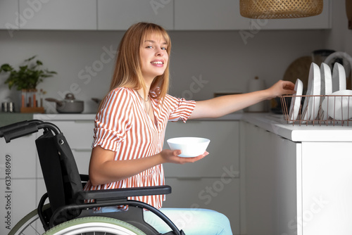 Young woman in wheelchair t...
