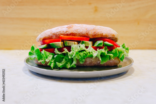 Avocado, tomato and lettuce sandwich, photography for catalog