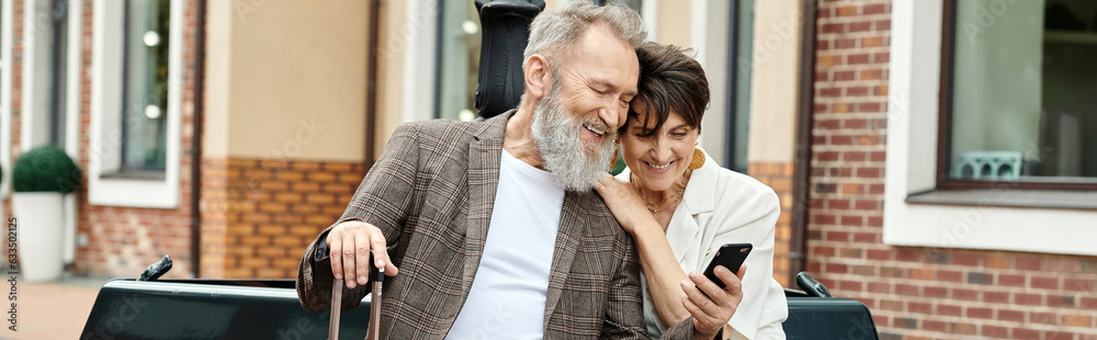 banner, elderly couple, happy senior man holding smartphone, sitting with woman using gadget banner, elderly couple, happy senior man holding smartphone, sitting with woman using gadget