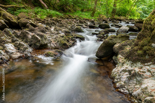 Long exposure of a waterfall on the East Lyn river at Watersmeet in Exmoor National Park