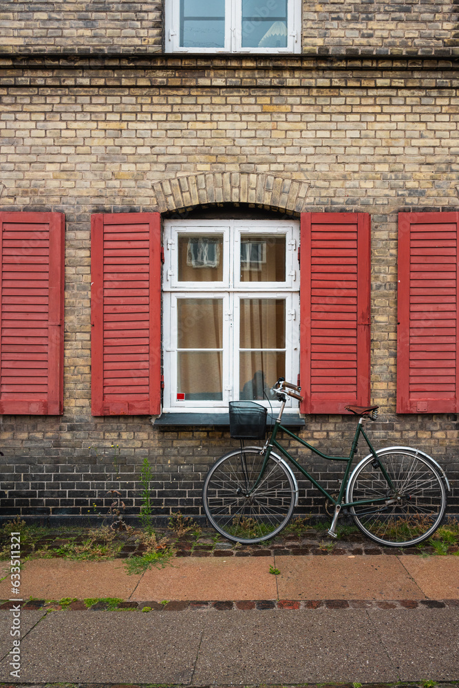 Bicycle by a Red-Blinded Window in Copenhagen, Denmark