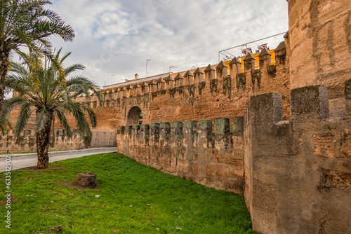 Ancient City Walls. Sevilla City Walls were first built by the Romans in the 1st century BC and then modified by others who conquered the city. Seville, Spain. photo
