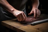 sharpening a knife using a leather strop